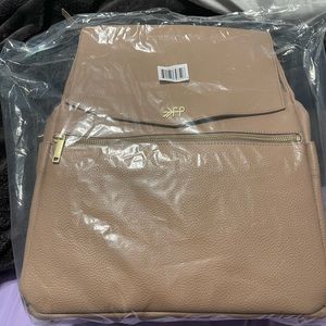 This is a brand new classic v2 diaper bag from freshly picked.